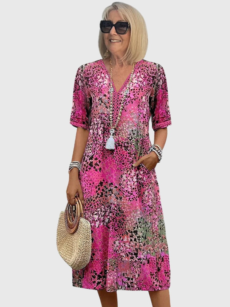 Bella · Midi Floral Elegante