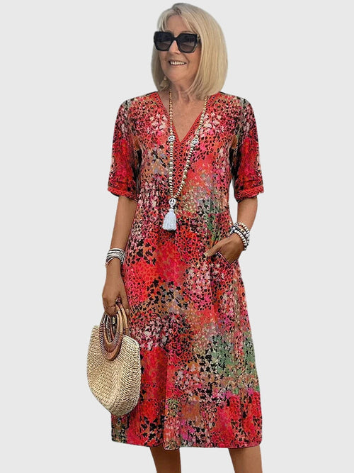 Bella · Midi Floral Elegante