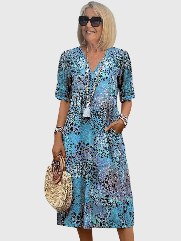 Bella · Midi Floral Elegante