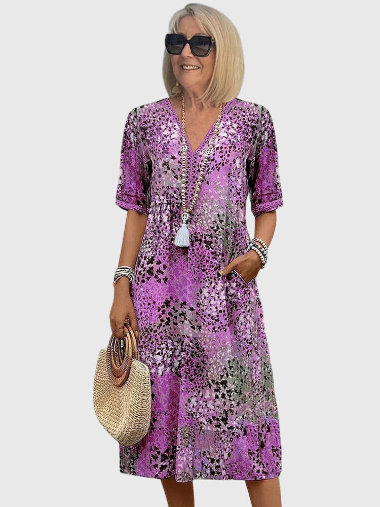 Bella · Midi Floral Elegante