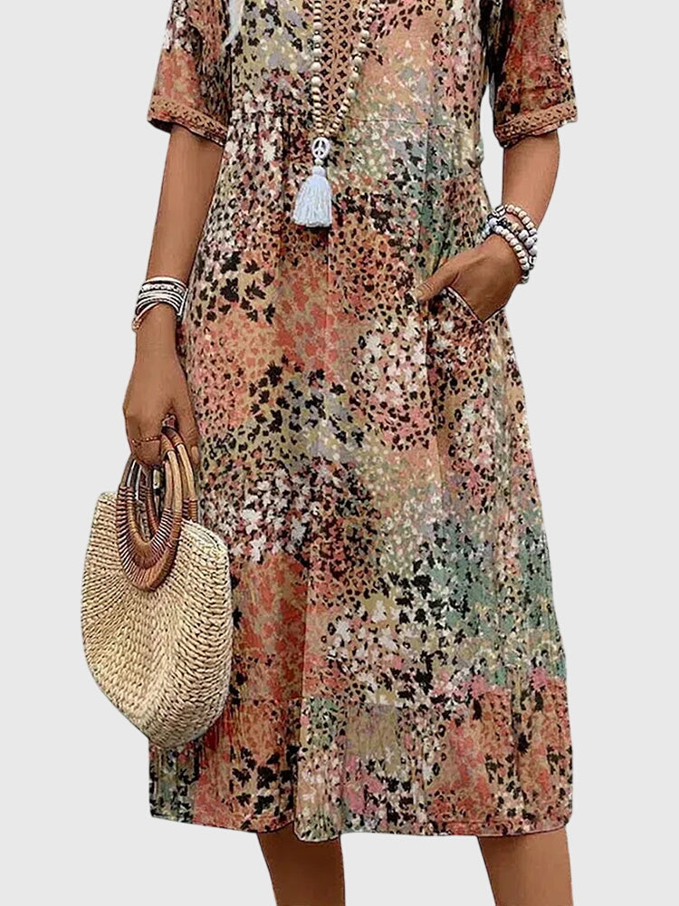 Bella · Midi Floral Elegante