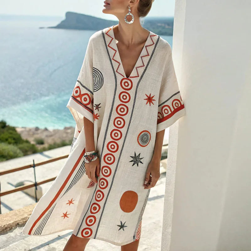 Vestido midi con tejido brillante color marfil y caída fluida en interior elegante